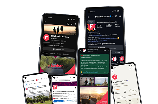 Sechs Smartphones mit verschiedenen Social-Media-Profilen und Beiträgen von FrankenTourismus.